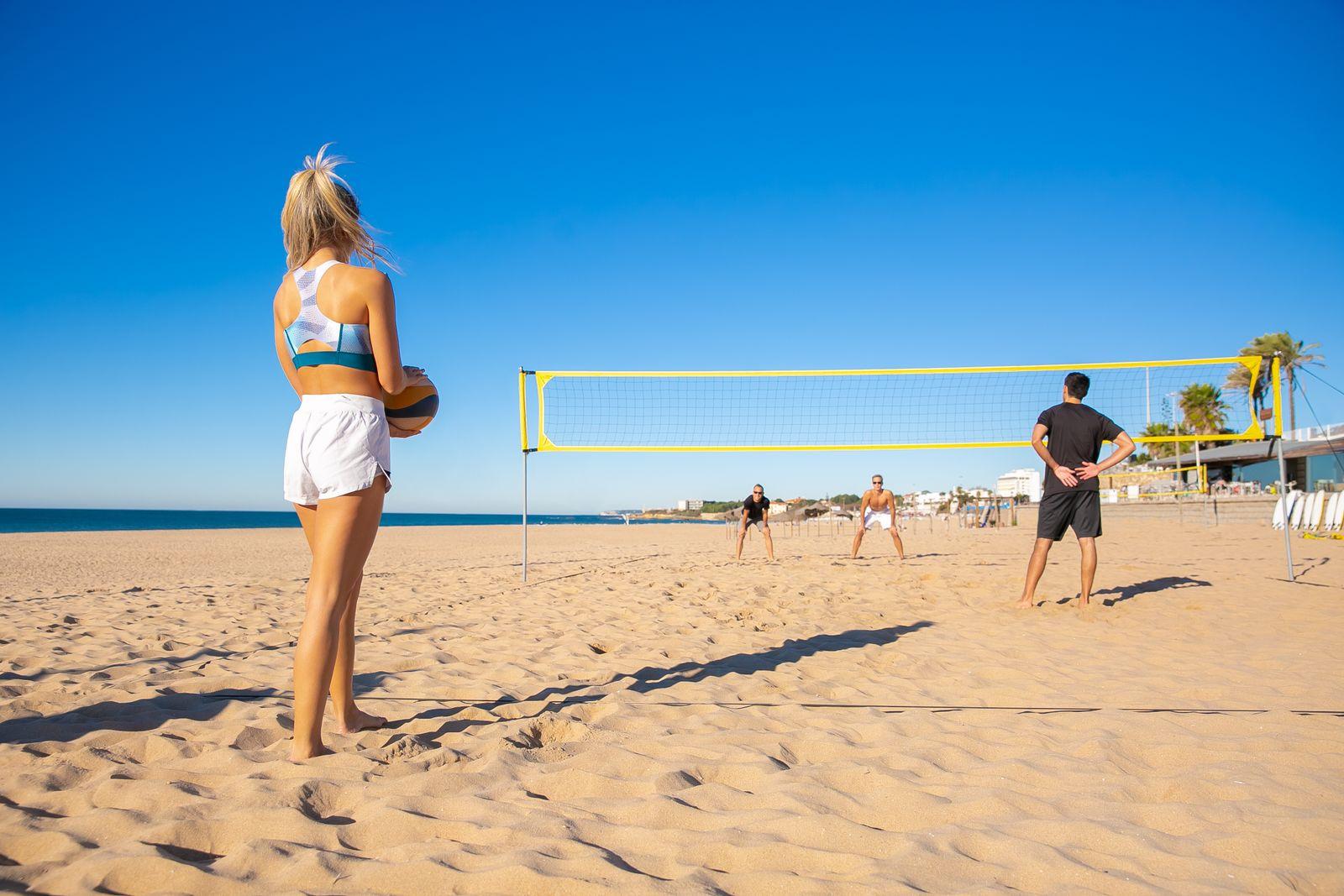 Beach volleyball players on the sand